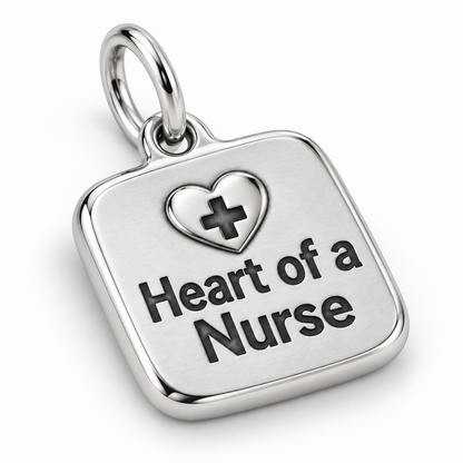 Heart of a Nurse Engraved Nurse Charm | macro face-up oblique view | c1abb278484a0e4b480db761f4208086cbd108ecf449bbbf097bd6a12aa9fab1