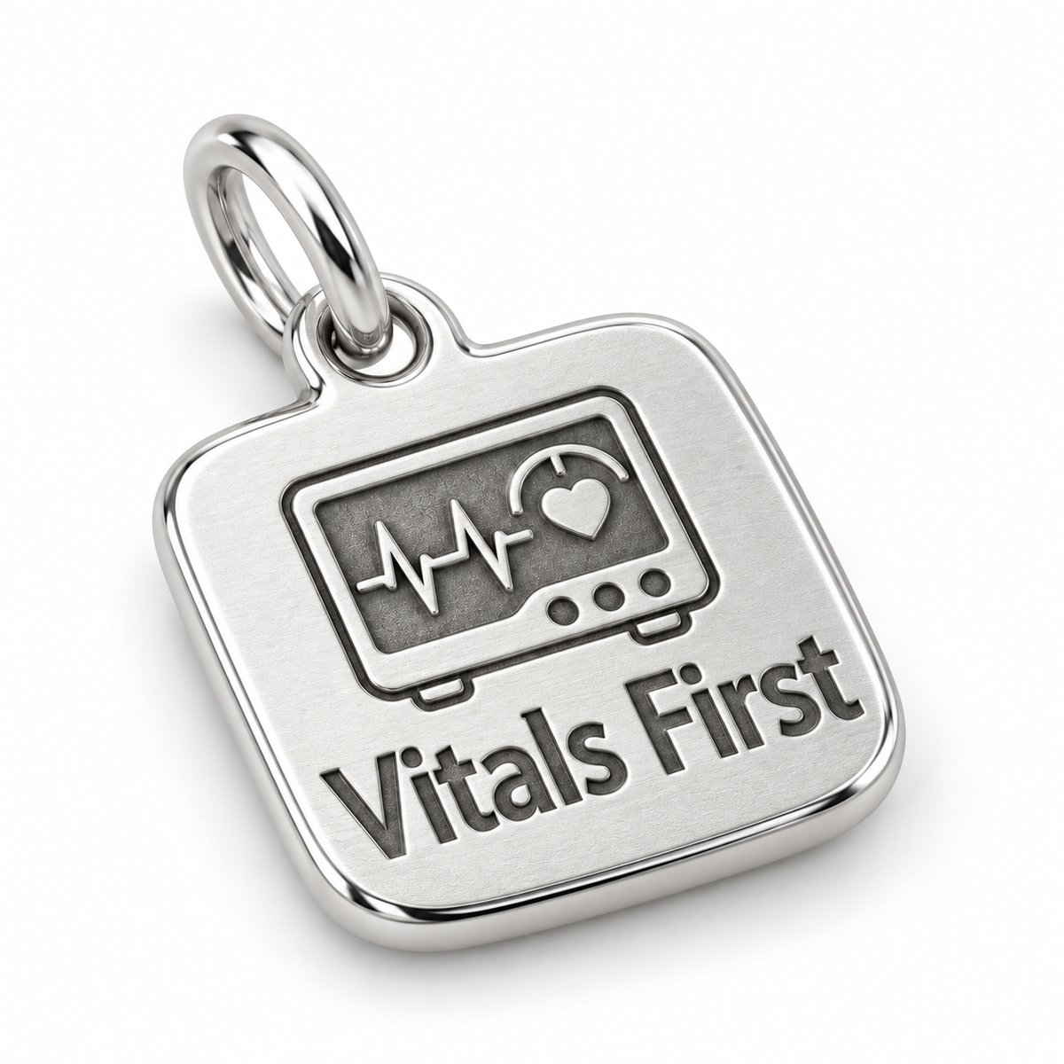 Vitals First Engraved Nurse Charm | macro face-up oblique view | 4d56c8a655f3499b63ef813978540a985b72ac0c0b85f9fe1dc0ba96b0f5d813