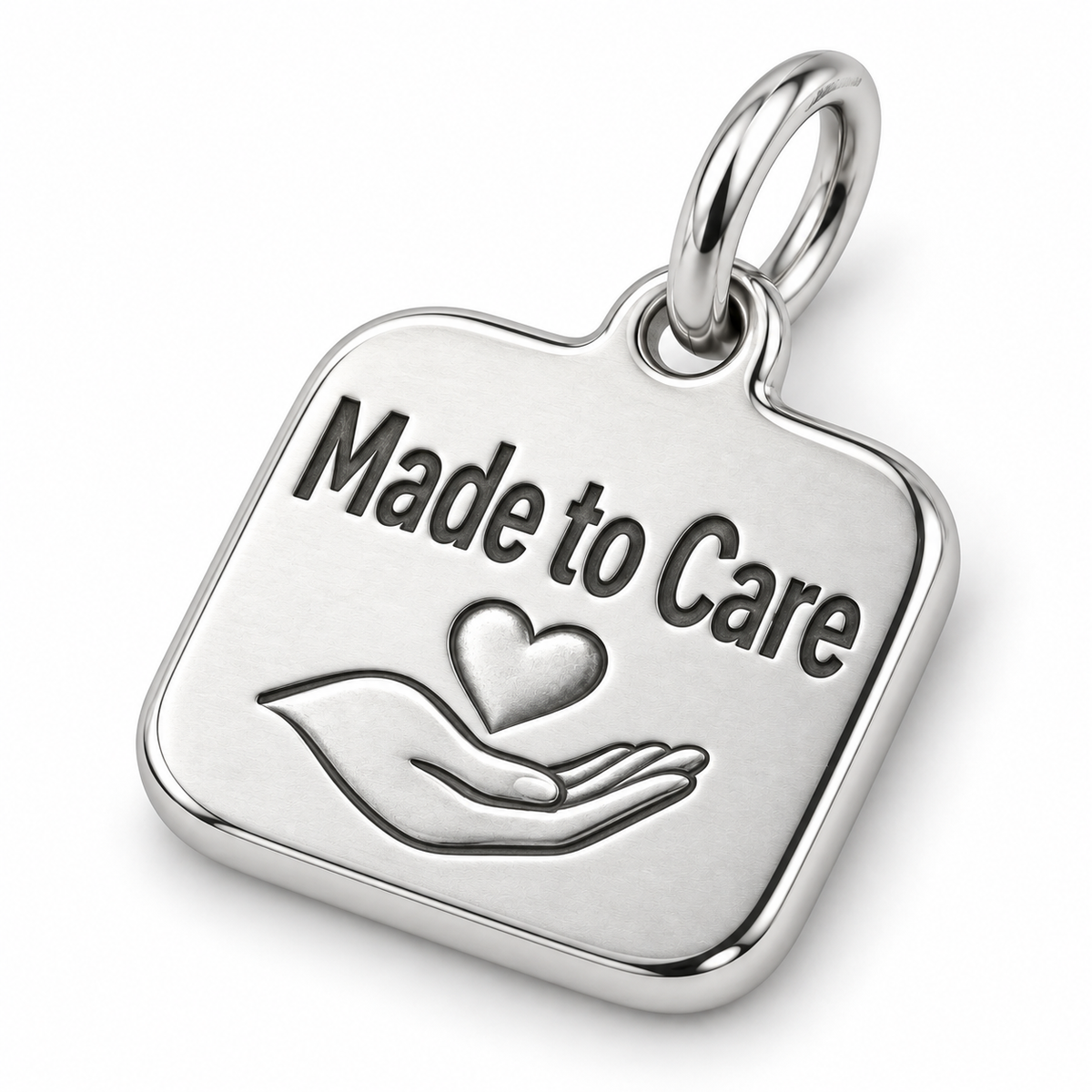 Made to Care Engraved Nurse Charm | macro face-up oblique view | f07d3b80c05a3802f9c8ee146d24d25161b2a1c088574d4104e2ad8cc2eafeaf