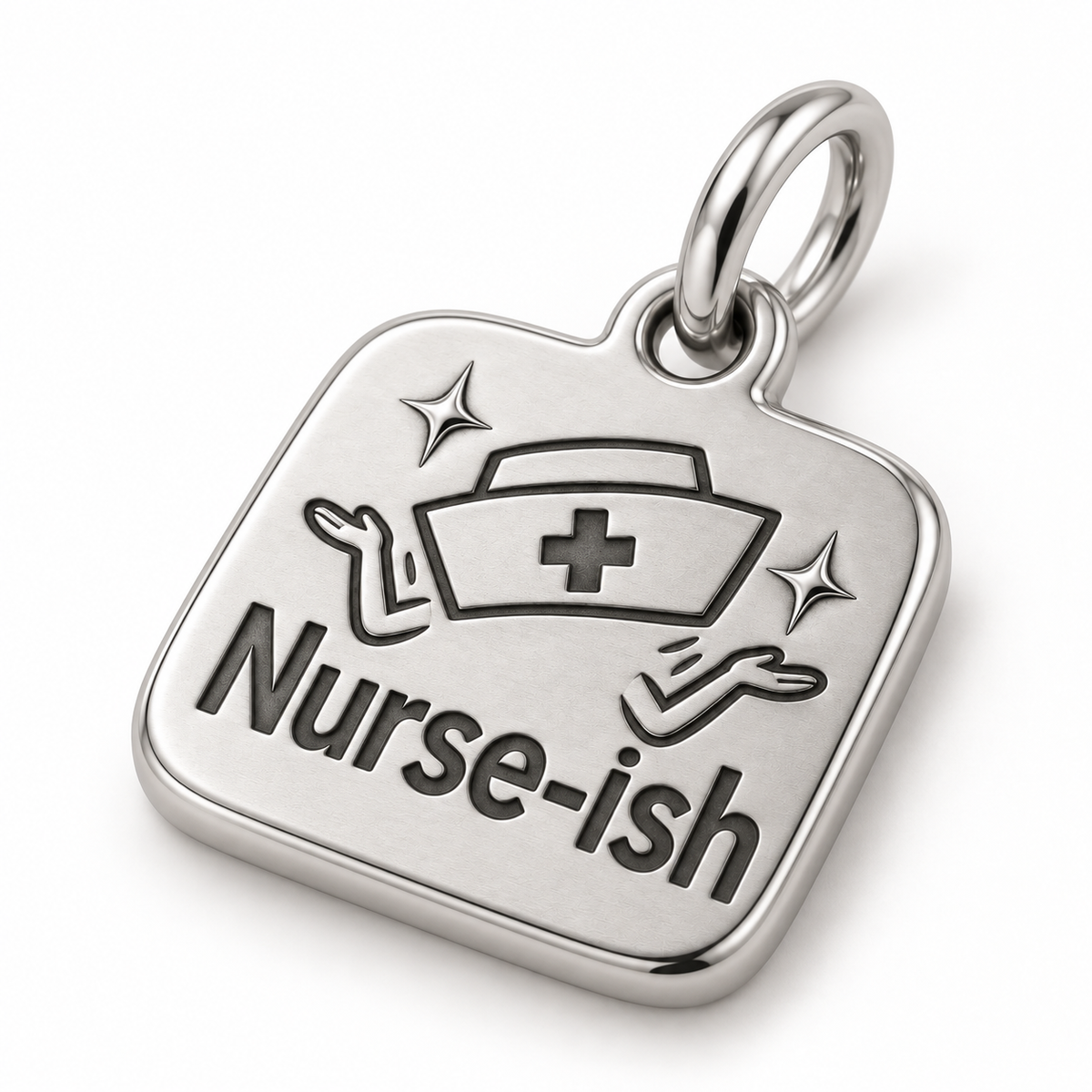 Nurse-ish Engraved Nurse Charm | macro face-up oblique view | 9c9e73aafbb61723ce0a44cd9f72e2c3c850c10835a84049473e543fc0d993a5