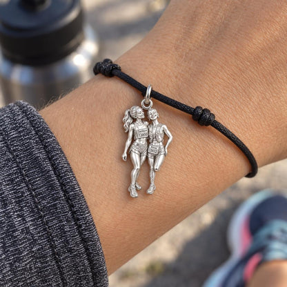 Marathon Besties Charm Bracelet – Personalized Runner Gift – worn on the wrist on a black cord bracelet
