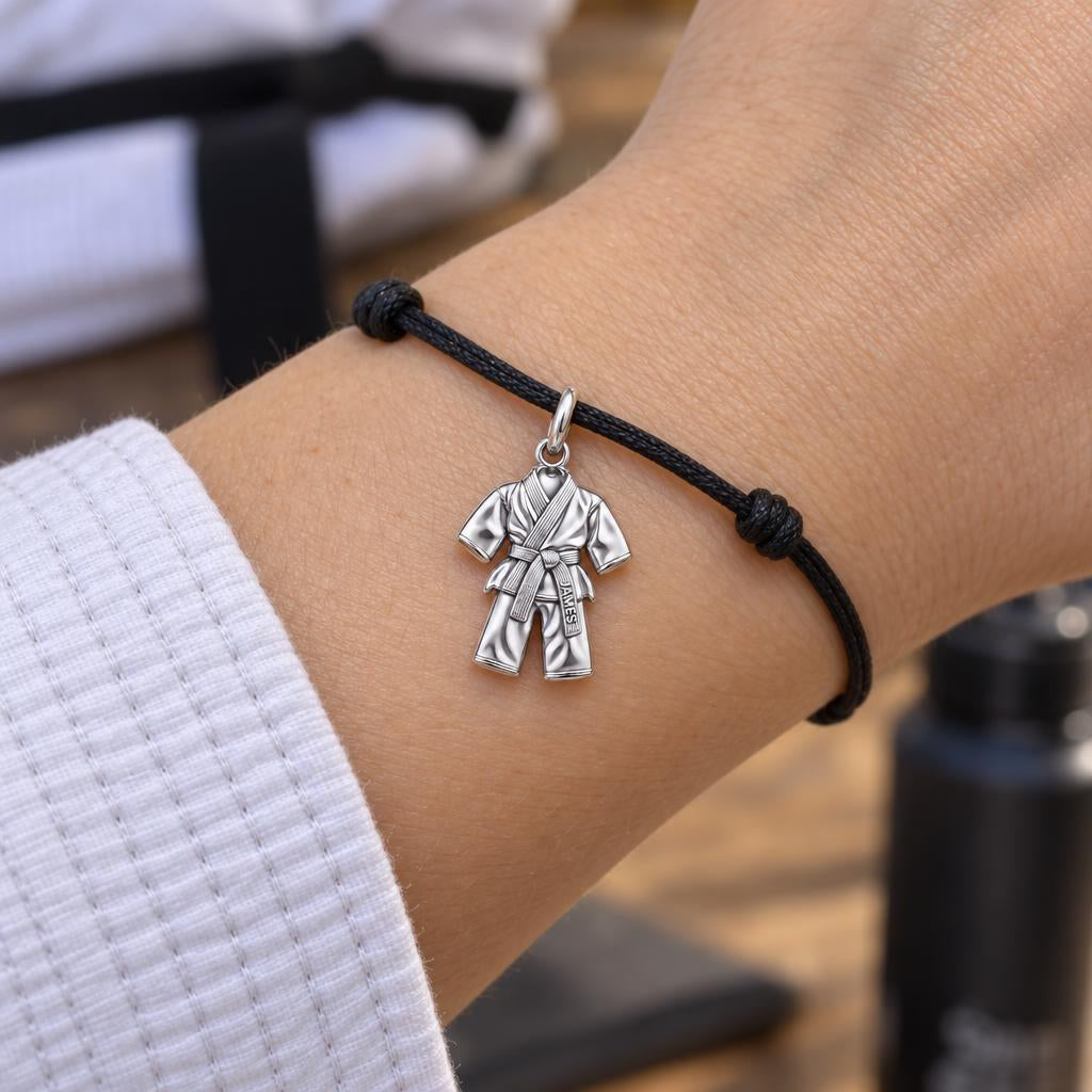 Martial Arts Gi Charm Bracelet – Personalized Student Gift – worn on the wrist on a black cord bracelet