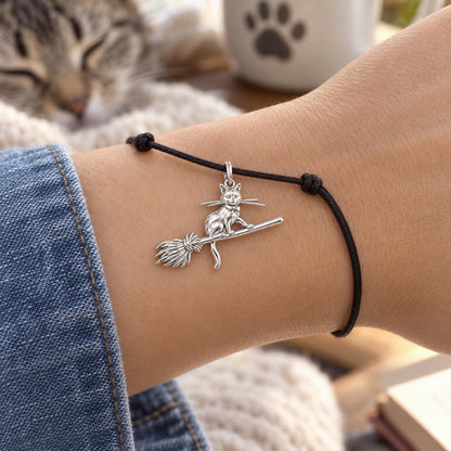 Midnight Flight Cat Charm Bracelet – Personalized Cat Mom Gift – worn on the wrist on a black cord bracelet