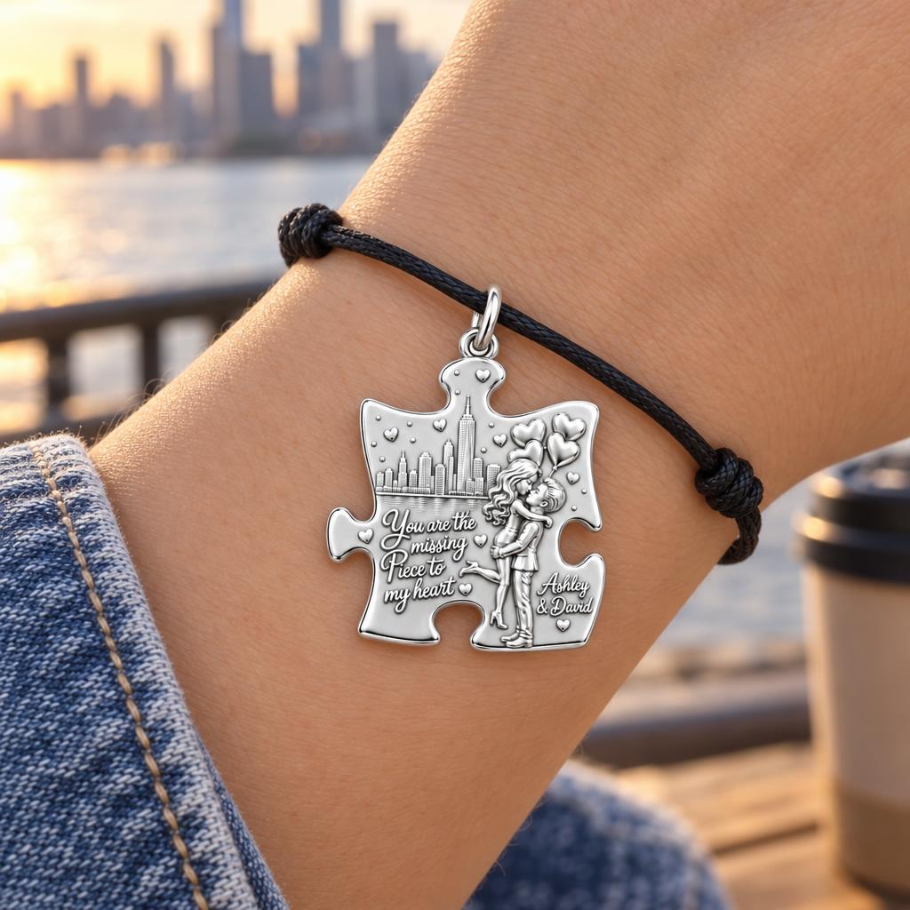 Missing Piece City Date Charm Bracelet – Personalized Couple Gift – worn on the wrist on a black cord bracelet