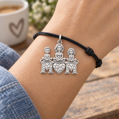 Mom and Her Little Hearts Charm Bracelet – Personalized Mom Gift – worn on the wrist on a black cord bracelet