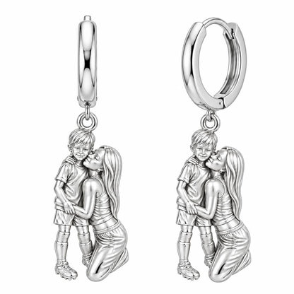 Mother and Son Embrace Huggie Charm Earrings – silver, front view