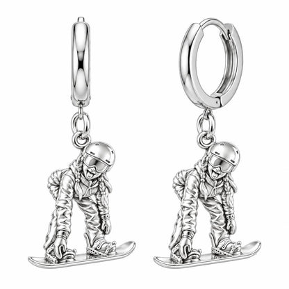 Mountain Bound Snowboarder Huggie Charm Earrings – silver, front view