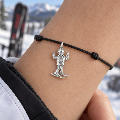 Mountain High Skier Charm Bracelet – Personalized Athlete Gift – worn on the wrist on a black cord bracelet