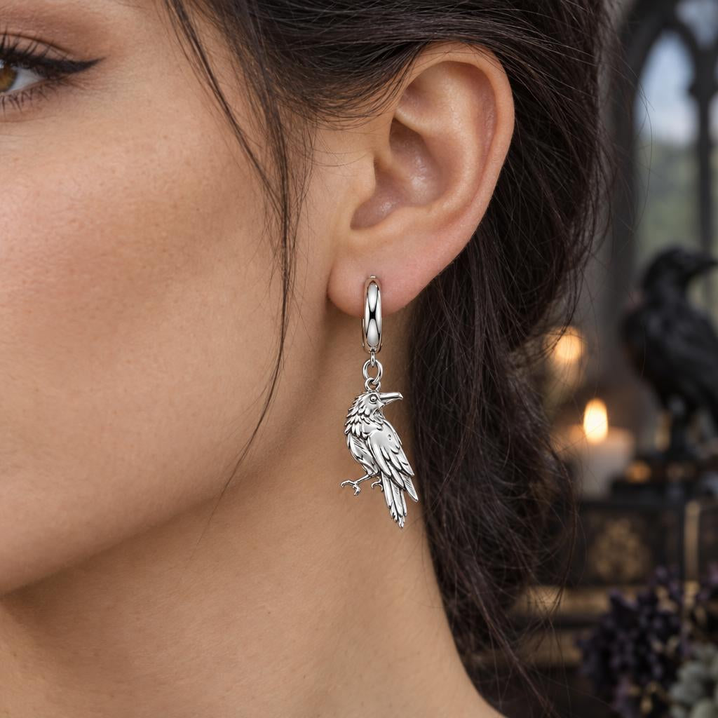 Mystic Raven Sentinel Huggie Charm Earrings – worn / in use