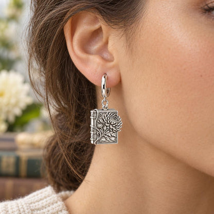 November Chrysanthemum Book Huggie Charm Earrings – worn / in use