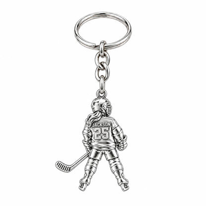 On The Ice Female Hockey Player Charm Keychain – silver, front view
