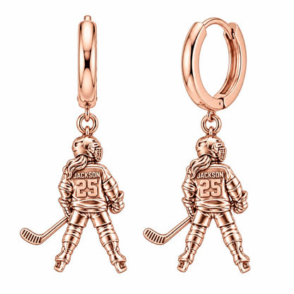 On The Ice Female Hockey Player Huggie Charm Earrings – rose gold, front view