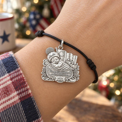 Patriotic Baby Sleigh Charm Bracelet – Personalized Mom Gift – worn on the wrist on a black cord bracelet