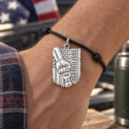 Patriotic Father Fist Bump Charm Bracelet – Personalized Dad Gift – worn on the wrist on a black cord bracelet