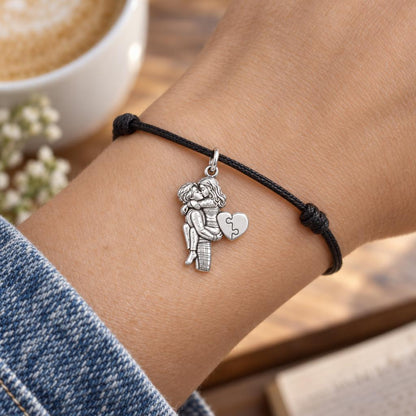Perfect Fit Puzzle Heart Charm Bracelet – Personalized Couple Gift – worn on the wrist on a black cord bracelet