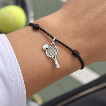 Perfect Match Tennis Charm Bracelet – Personalized Athlete Gift – worn on the wrist on a black cord bracelet