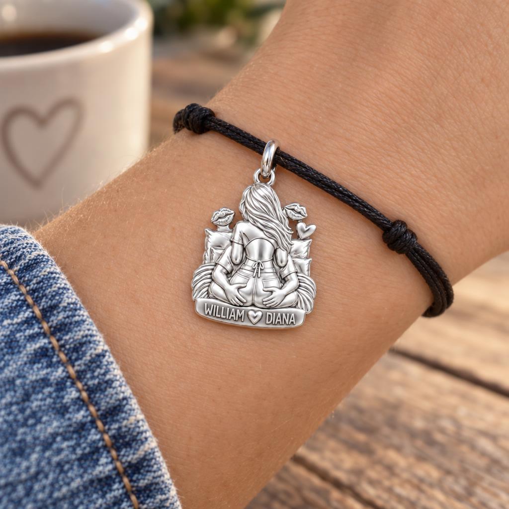 Playful Couple Embrace Charm Bracelet – Personalized Couple Gift – worn on the wrist on a black cord bracelet