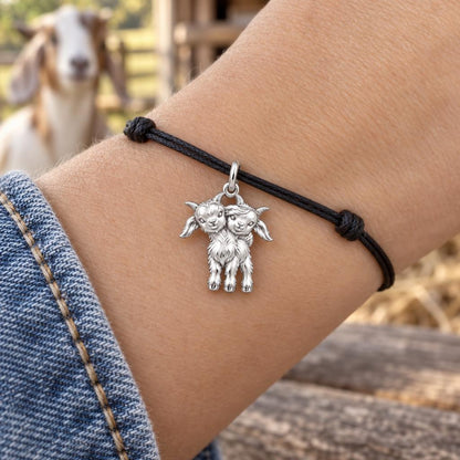 Playful Twin Goats Charm Bracelet – Personalized Mom Gift – worn on the wrist on a black cord bracelet
