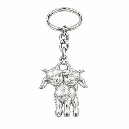 Playful Twin Goats Charm Keychain – silver, front view