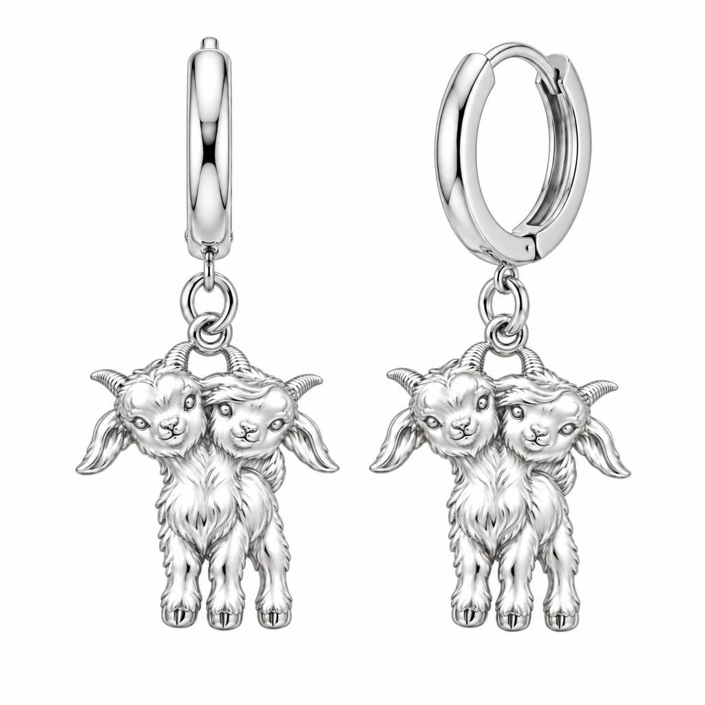 Playful Twin Goats Huggie Charm Earrings – silver, front view