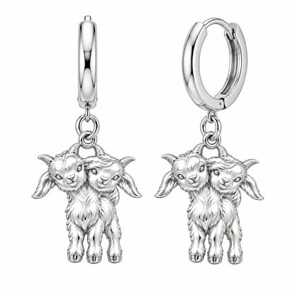 Playful Twin Goats Huggie Charm Earrings – silver, front view