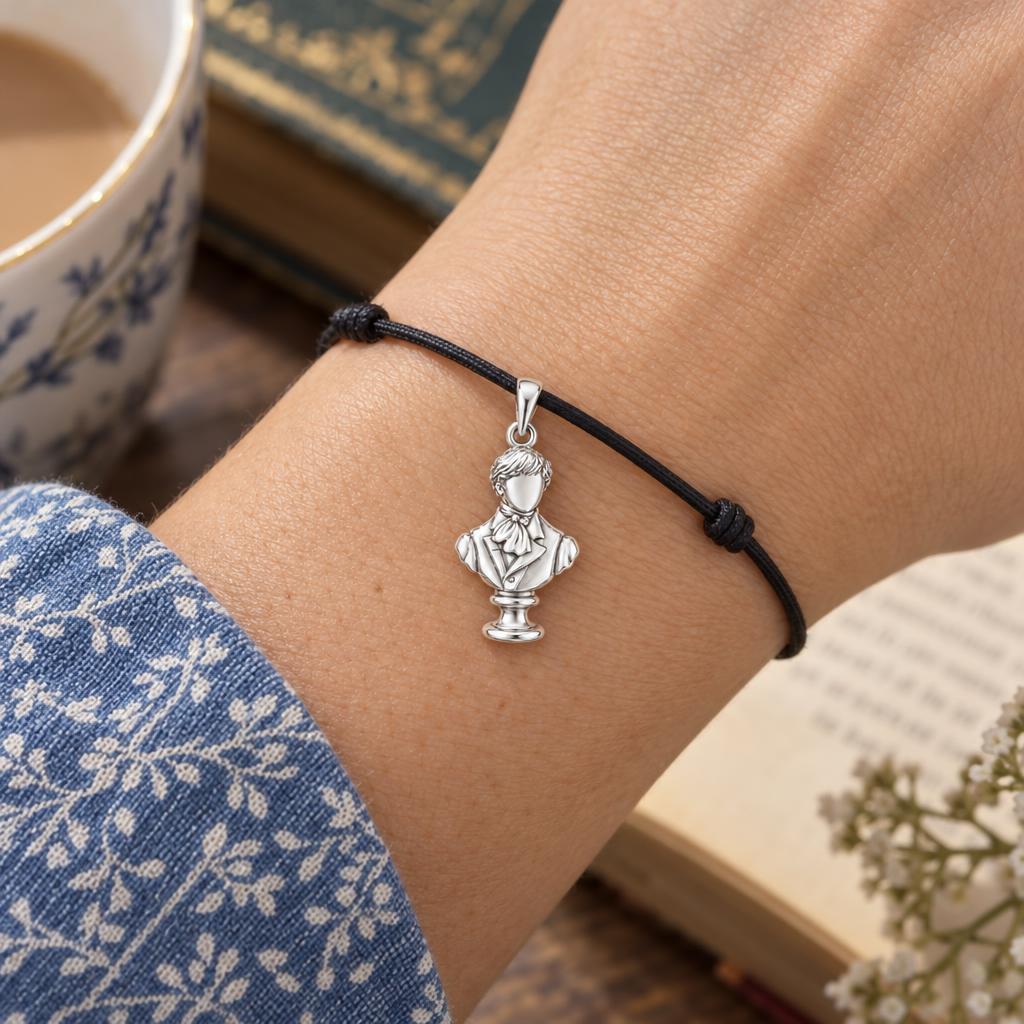 Price And Prejudice Bracelet – Timeless Love Keepsake – worn on the wrist on a black cord bracelet