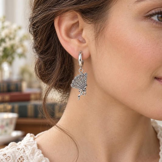 Pride and Prejudice Fan Huggie Charm Earrings – worn / in use