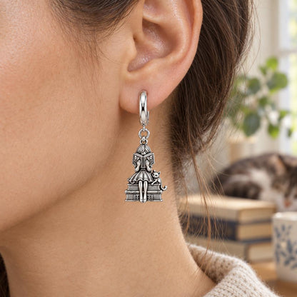 Quiet Reader and Cat Huggie Charm Earrings – worn / in use