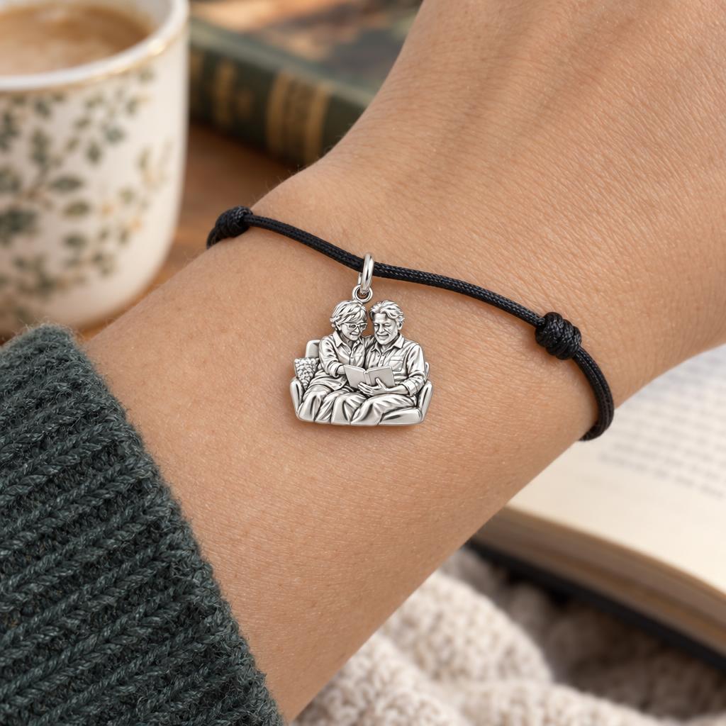 Reading Together Charm Bracelet – Personalized Couple Gift – worn on the wrist on a black cord bracelet