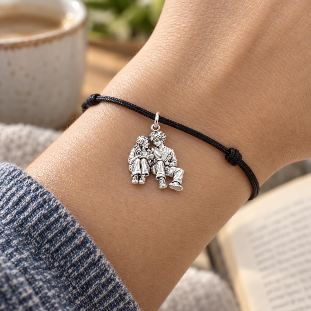 Reading Together Charm Bracelet – Personalized Couple Gift – worn on the wrist on a black cord bracelet