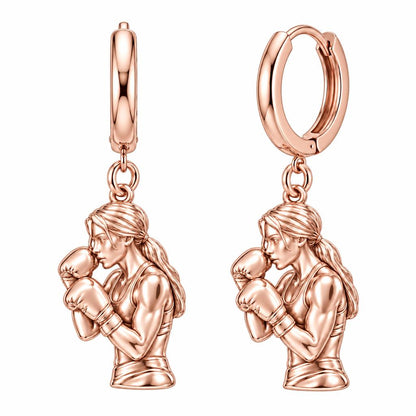Resilient Female Boxer Huggie Charm Earrings – rose gold, front view