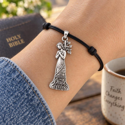 Rooted in Faith Charm Bracelet – Personalized Christian Gift – worn on the wrist on a black cord bracelet