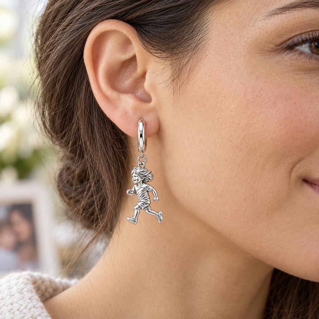 Running Child Joy Huggie Charm Earrings – worn / in use
