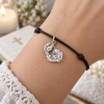 Sacred Baptism Moment Charm Bracelet – Personalized Memorial Gift – worn on the wrist on a black cord bracelet