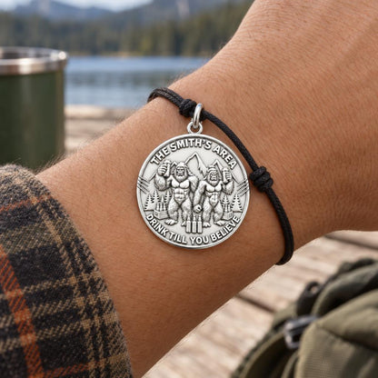 Sasquatch Cheers Charm Bracelet – Personalized Couple Gift – worn on the wrist on a black cord bracelet