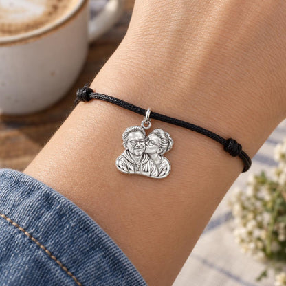 Sculpted Sweetheart Portrait Charm Bracelet – Personalized Couple Gift – worn on the wrist on a black cord bracelet