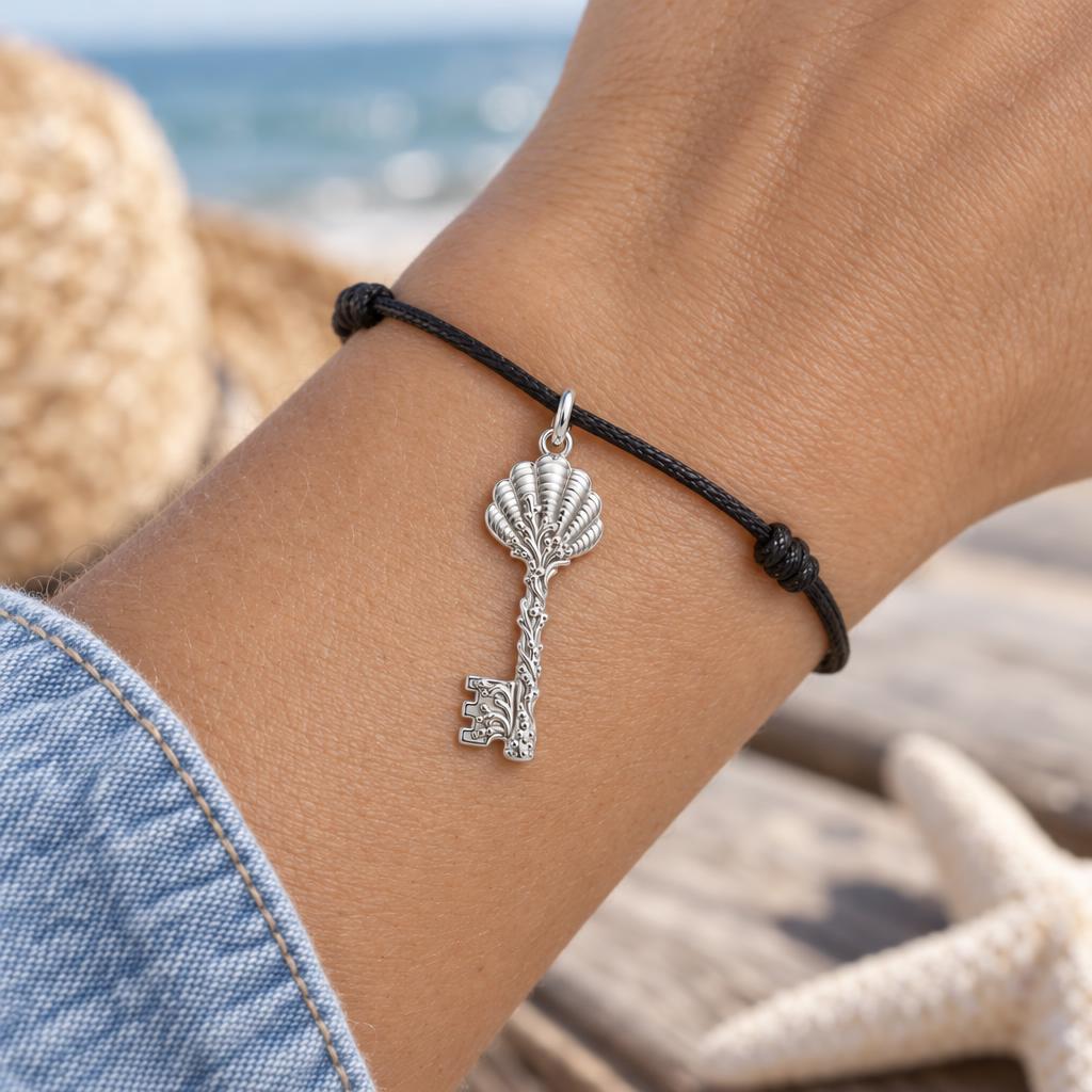 Seashell Skeleton Key Charm Bracelet – Personalized Mom Gift – worn on the wrist on a black cord bracelet
