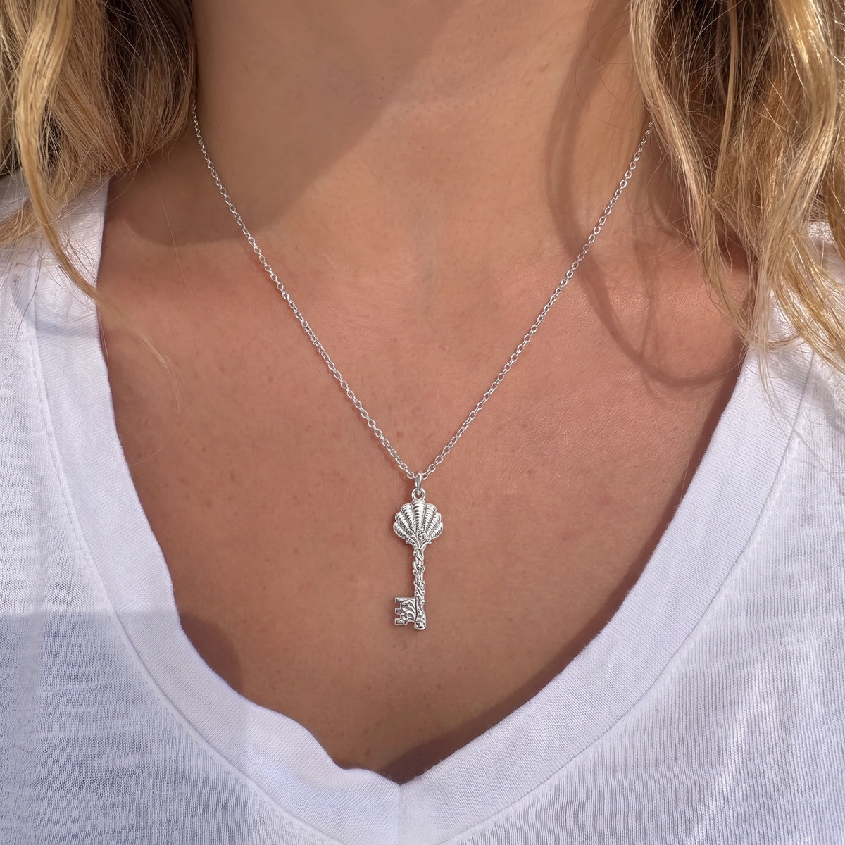Seashell Skeleton Key Charm Necklace Set – worn / in use
