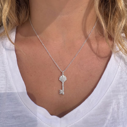 Seashell Skeleton Key Charm Necklace Set – worn / in use