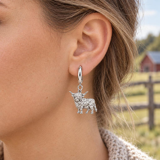 Shaggy Highland Cow Huggie Charm Earrings – worn / in use