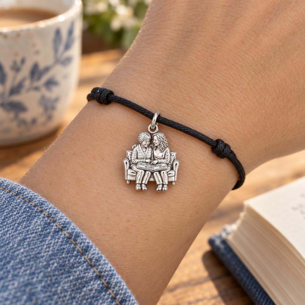 Shared Memories Sofa Charm Bracelet – Personalized Mom Gift – worn on the wrist on a black cord bracelet