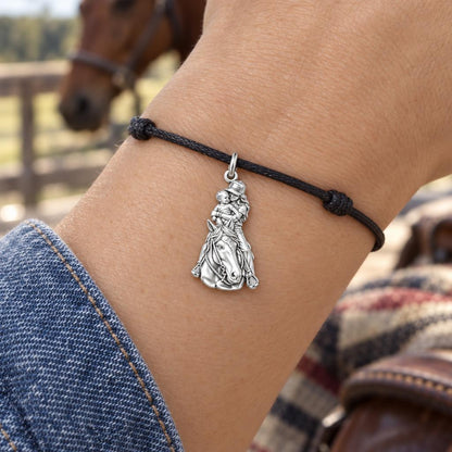 Shared Saddle Ride Charm Bracelet – Personalized Mom Gift – worn on the wrist on a black cord bracelet