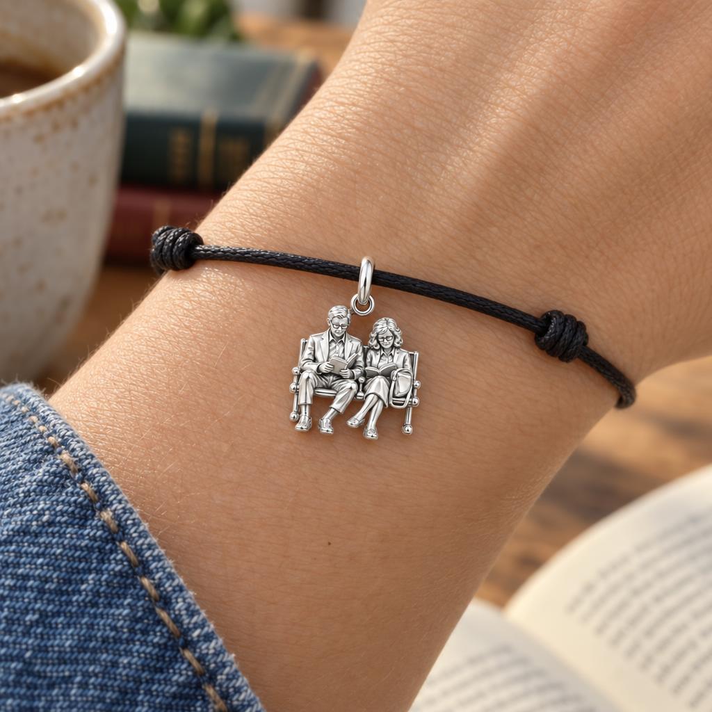Shared Story Bench Charm Bracelet – Personalized Couple Gift – worn on the wrist on a black cord bracelet