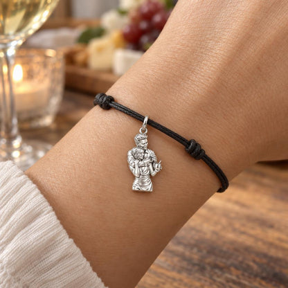 Shared Toast Portrait Charm Bracelet – Personalized Couple Gift – worn on the wrist on a black cord bracelet
