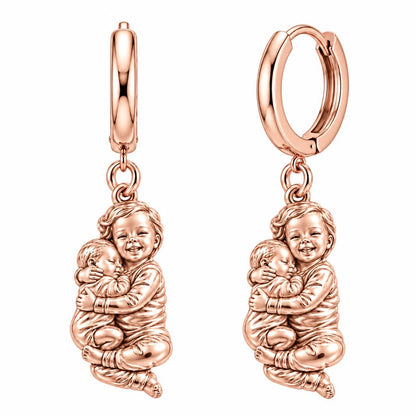 Siblings Forever Hug Huggie Charm Earrings – rose gold, front view