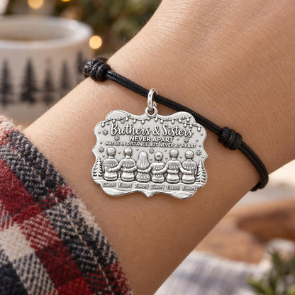 Siblings Never Apart Charm Bracelet – Personalized Sibling Gift – worn on the wrist on a black cord bracelet