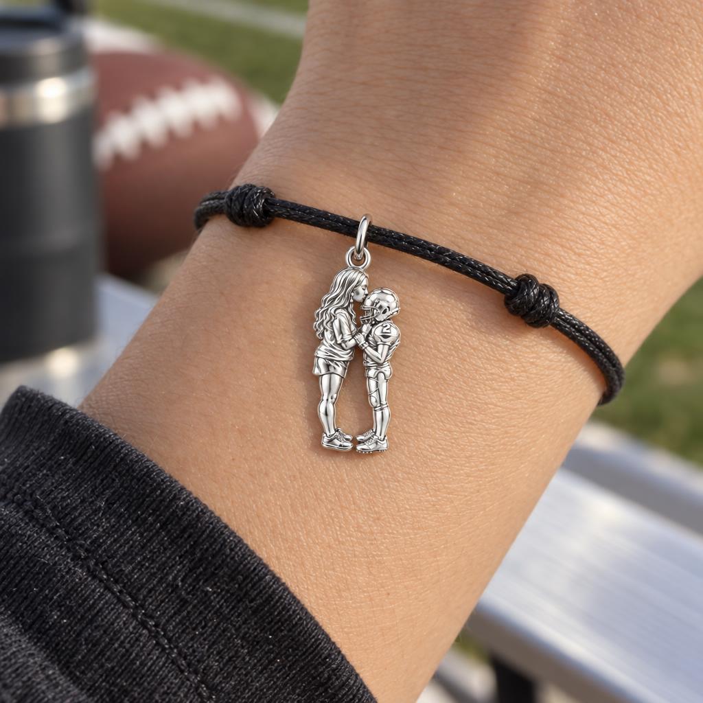 Sideline Kiss Football Charm Bracelet – Personalized Mom Gift – worn on the wrist on a black cord bracelet