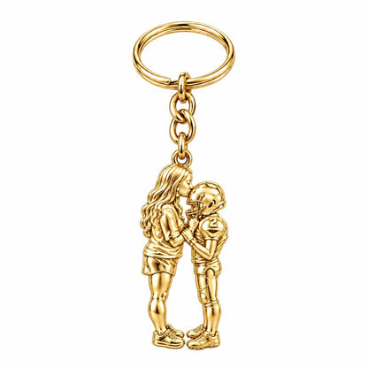 Sideline Kiss Football Charm Keychain – 18K gold, front view