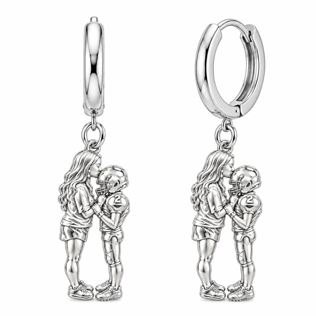 Sideline Kiss Football Huggie Charm Earrings – silver, front view