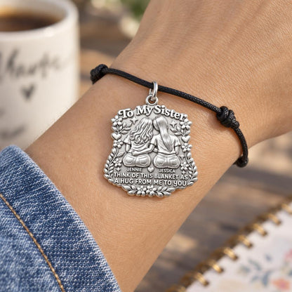 Sister Hug Blanket Charm Bracelet – Personalized Sister Gift – worn on the wrist on a black cord bracelet